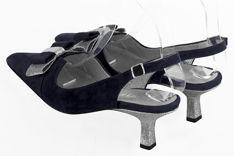 Navy blue women's open back shoes, with a knot. Tapered toe. Medium spool heels. Rear view - Florence KOOIJMAN